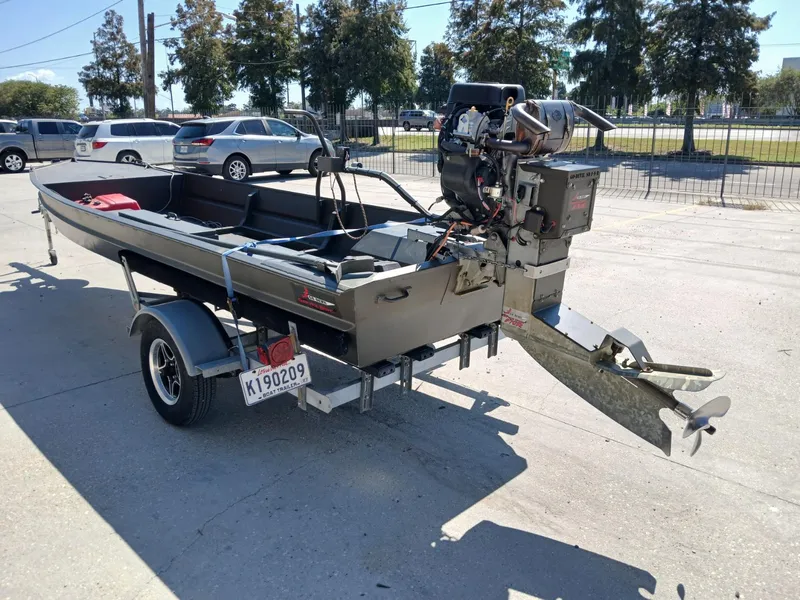 Slide: The Image of 2023 Go-Devil 18x48 boat on trailer, parked outdoors. - 6