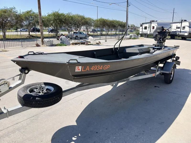 Slide: The Image of 2023 Go-Devil 18x48 boat on trailer, parked outdoors in a lot. - 9