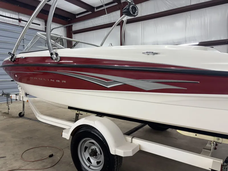 Slide: The Image of 2008 Bayliner Bowrider 185 on trailer in indoor storage facility. - 12