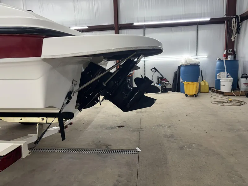 Slide: The Image of 2008 Bayliner Bowrider 185 boat in storage, showing rear and propeller. - 3