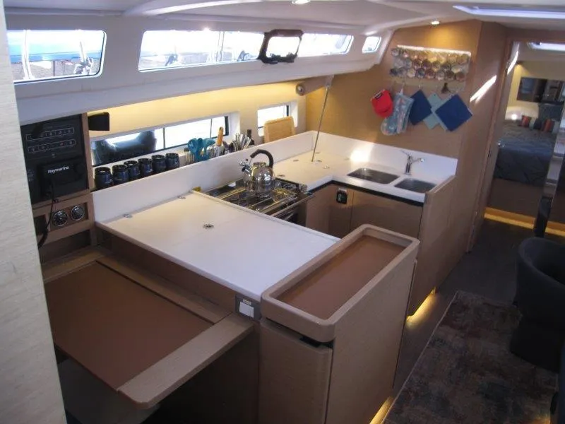 Slide: The Image of Modern kitchen interior of 2021 Jeanneau Sun Odyssey 440 yacht. - 2