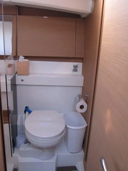 Slide: The Image of Bathroom interior of 2021 Jeanneau Sun Odyssey 440 yacht, featuring modern amenities. - 22