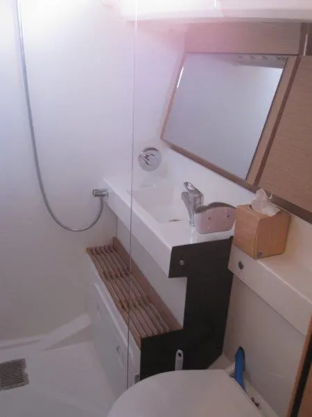 Slide: The Image of Modern bathroom in 2021 Jeanneau Sun Odyssey 440 yacht, featuring sleek design and fixtures. - 23
