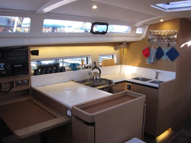 Slide: The Image of Modern kitchen interior of 2021 Jeanneau Sun Odyssey 440 yacht. - 25