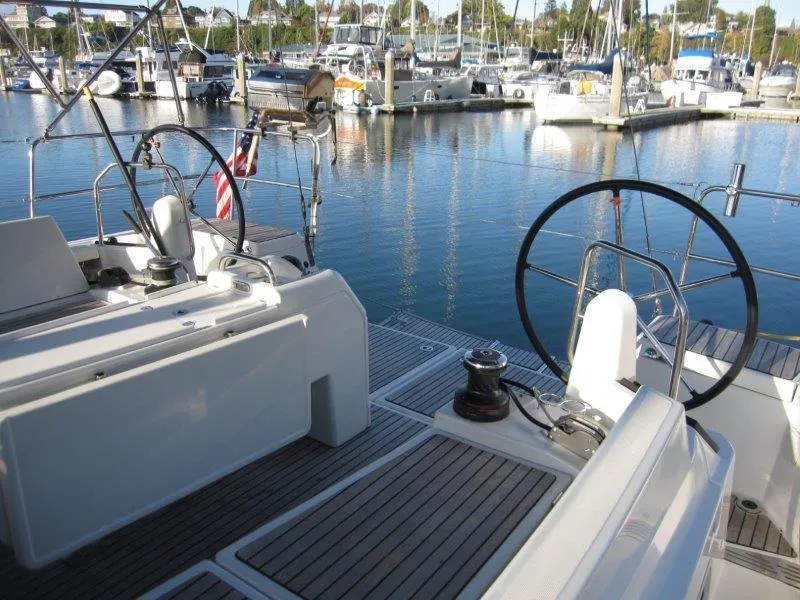 Slide: The Image of Jeanneau Sun Odyssey 440 sailboat cockpit in marina, 2021 model. - 46