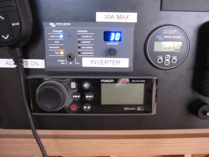 Slide: The Image of Control panel of 2021 Jeanneau Sun Odyssey 440 with inverter and audio system. - 6