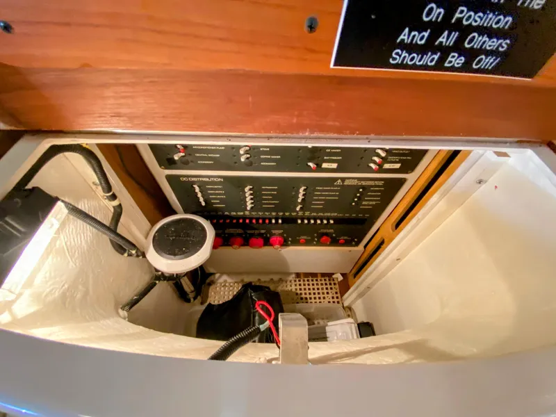 Slide: The Image of Electrical panel of 2001 Tiara Yachts 3800 Open, featuring DC distribution controls. - 46