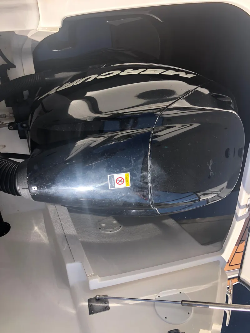 Slide: The Image of 2014 Sea Ray 370 Venture boat with Mercury outboard engine. - 16