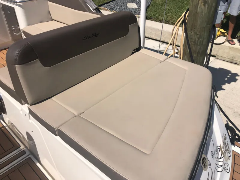 Slide: The Image of 2014 Sea Ray 370 Venture boat with beige seating and backrest. - 43