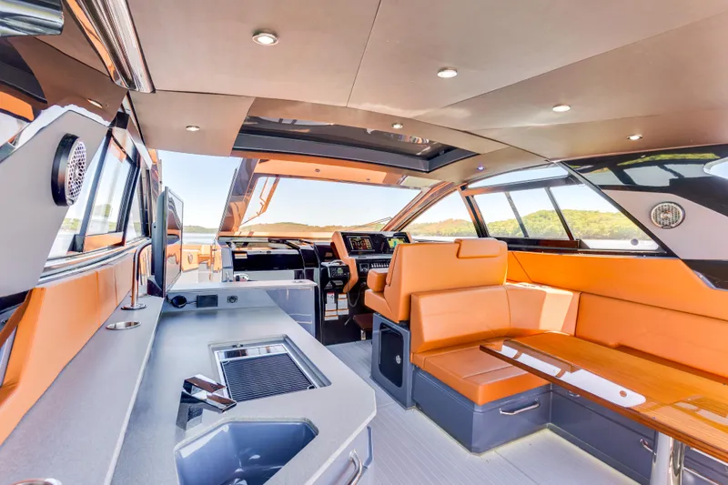 Slide: The Image of Luxurious interior of 2023 Cruisers Yachts 42 GLS with modern amenities and sleek design. - 17
