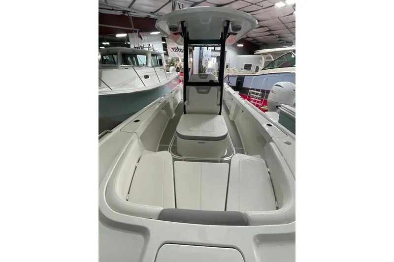 Slide: The Image of 2025 Parker 2400 Center Console boat interior, featuring spacious seating and modern design. - 10