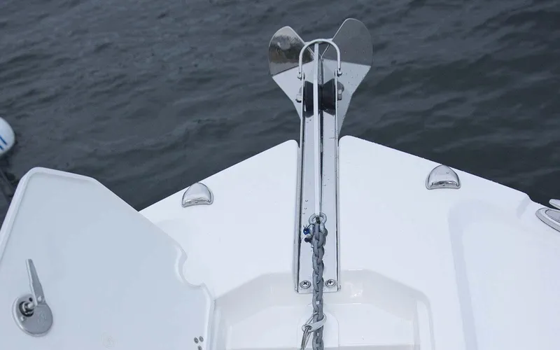 Slide: The Image of 2025 Parker 2400 Center Console boat interior with white seating and modern design. - 9