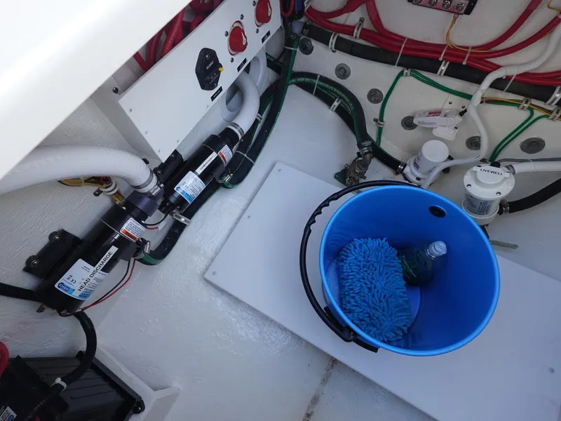 Slide: The Image of 2024 Albemarle 30 Express engine room with maintenance equipment and wiring. - 21