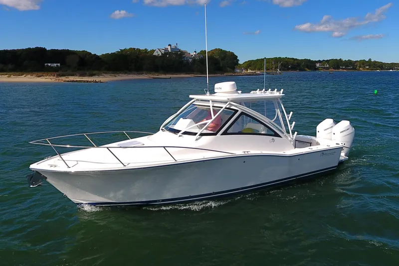 Slide: The Image of 2024 Albemarle 30 Express boat cruising on a sunny day. - 6