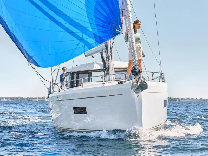 Slide: The Image of Sailing on a 2025 Moody 41 DS yacht with vibrant blue sails. - 10