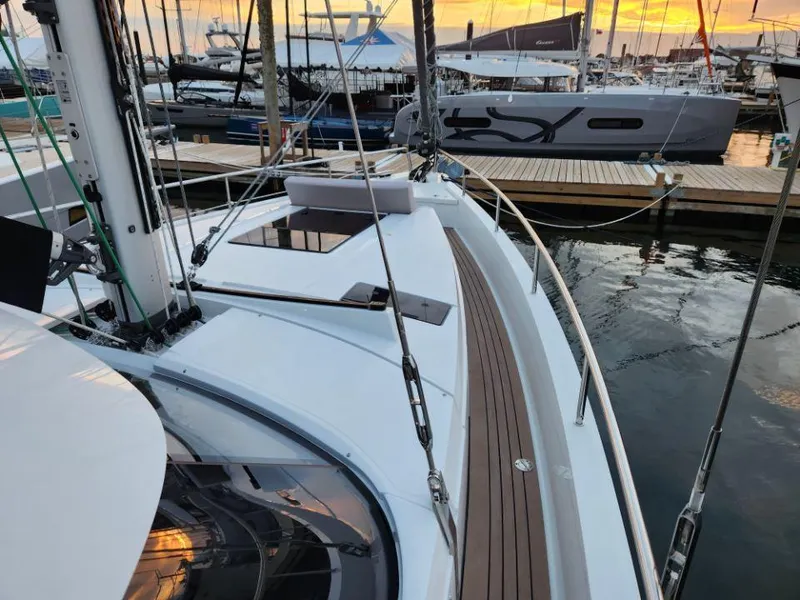 Slide: The Image of Sleek 2025 Moody 41 DS yacht docked at sunset, showcasing modern design and craftsmanship. - 24