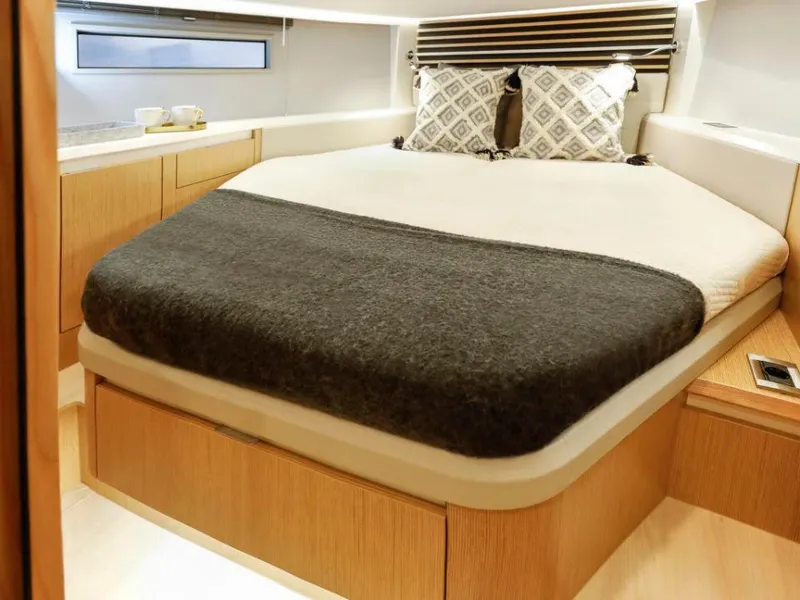 Slide: The Image of Luxurious bedroom interior of 2025 Moody 41 DS yacht with modern design. - 33