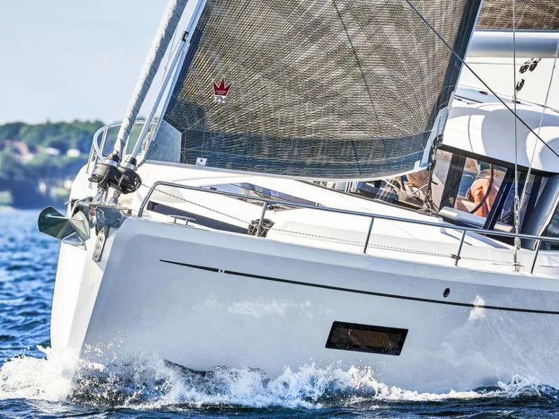 Slide: The Image of Sailing yacht Moody 41 DS 2025 gliding through water with sails unfurled. - 9