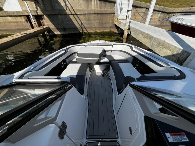 Slide: The Image of 2023 Yamaha Boats 275 SDX interior, featuring sleek seating and modern design. - 14