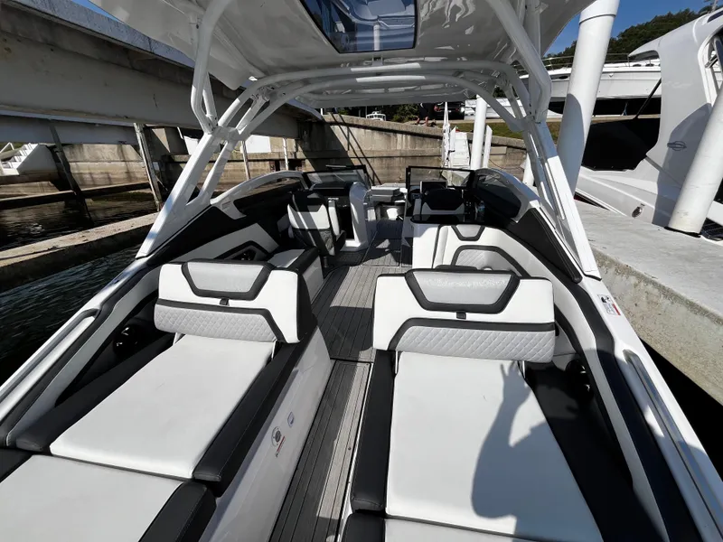 Slide: The Image of 2023 Yamaha Boats 275 SDX interior with sleek seating and modern design. - 18