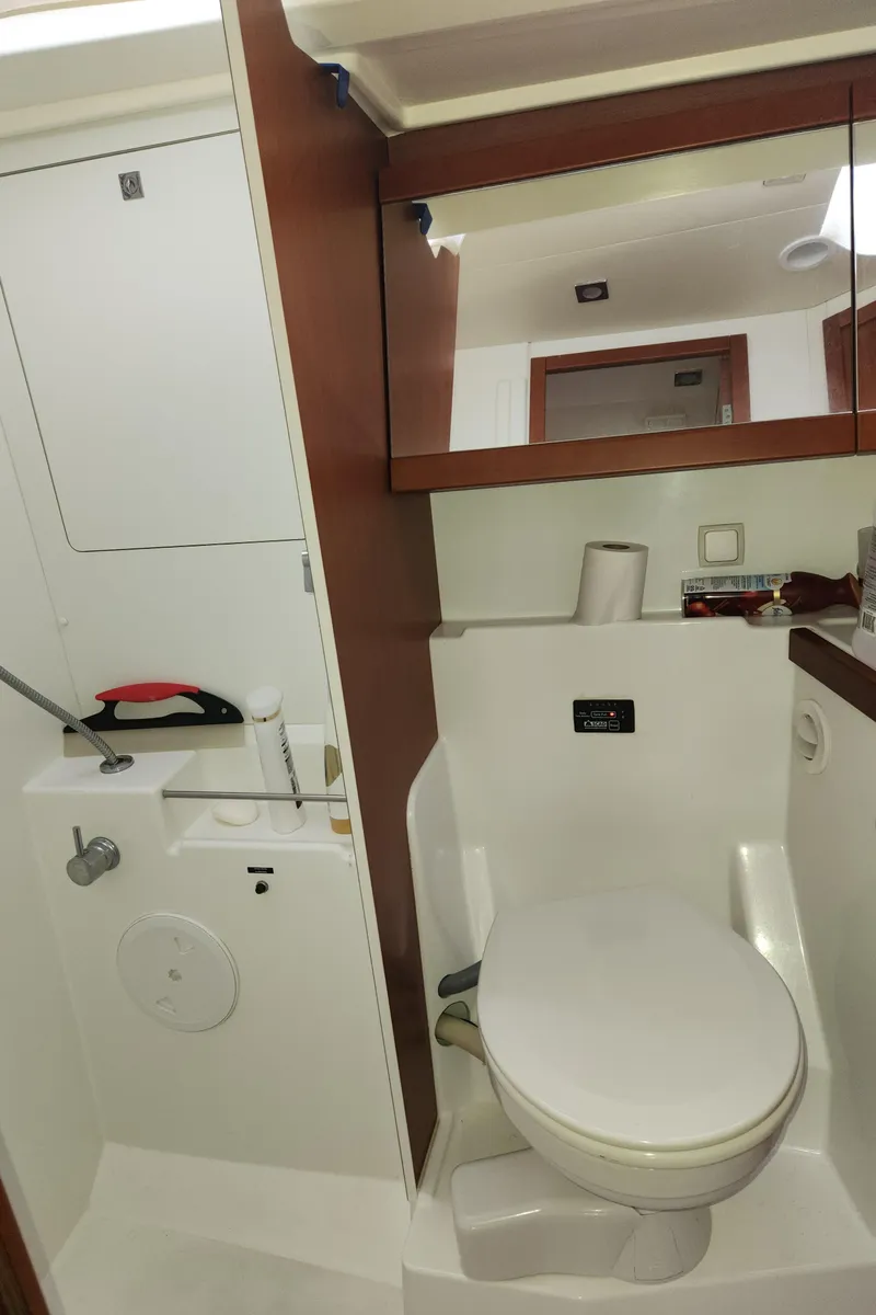 Slide: The Image of 2013 Beneteau Oceanis 48 yacht bathroom with modern fixtures and compact design. - 20
