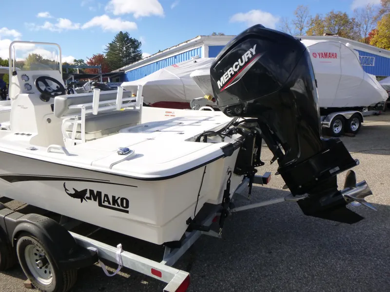 Slide: The Image of 2022 Mako 19CC boat with Mercury outboard motor on trailer. - 3