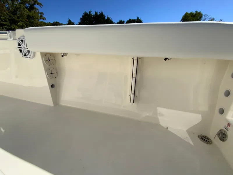 Slide: The Image of 2025 Cobia 220 Center Console boat interior with clean, spacious deck. - 35