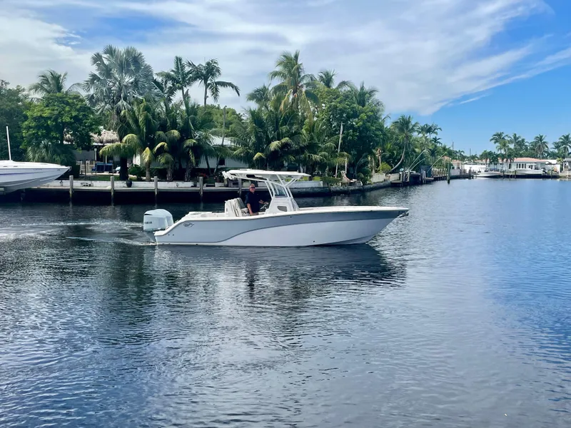 Slide: The Image of 2019 Sea Fox 288 Commander boat cruising on a calm tropical waterway. - 0