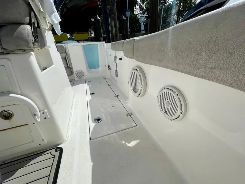 Slide: The Image of 2019 Sea Fox 288 Commander boat interior with speakers and cushioned seating. - 14