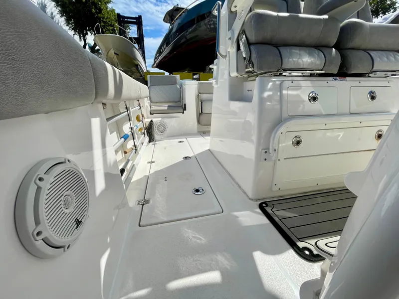 Slide: The Image of 2019 Sea Fox 288 Commander boat interior with seating and storage compartments. - 15