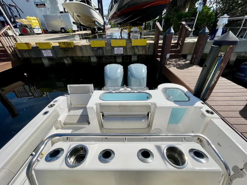 Slide: The Image of 2019 Sea Fox 288 Commander boat with dual engines docked at marina. - 25