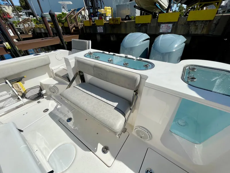 Slide: The Image of 2019 Sea Fox 288 Commander boat interior with seating and storage compartments. - 28