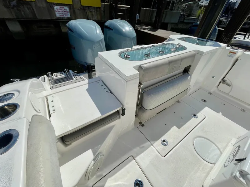 Slide: The Image of 2019 Sea Fox 288 Commander boat interior with seating and dual outboard motors. - 30