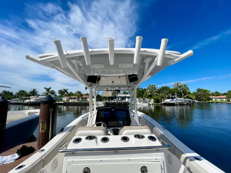 Slide: The Image of 2019 Sea Fox 288 Commander boat docked on a sunny day, featuring a sleek design. - 34