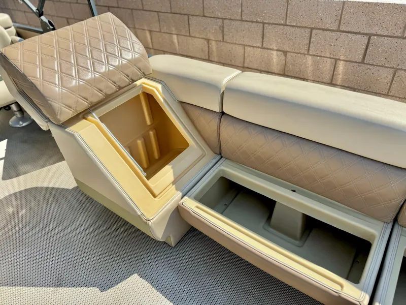 Slide: The Image of 2023 Massimo Marine P23 MAX boat seat with storage compartments open. - 10