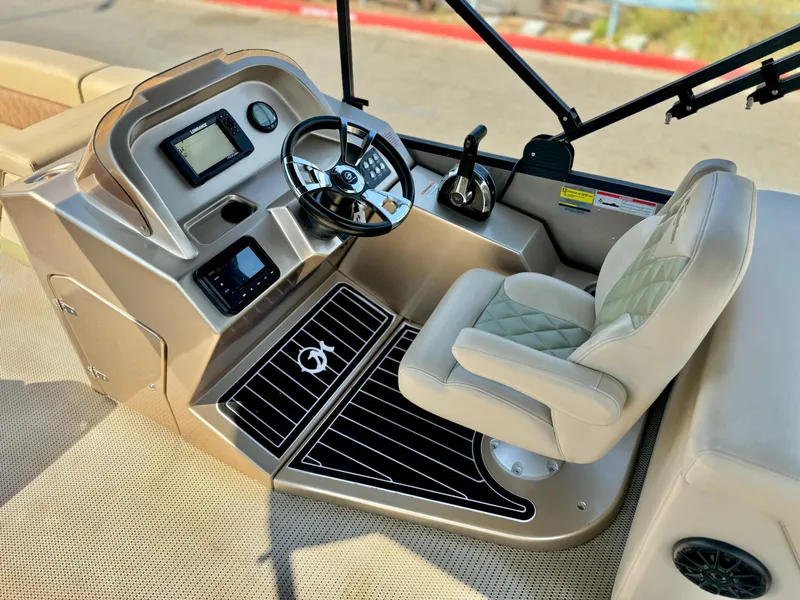 Slide: The Image of 2023 Massimo Marine P23 MAX boat cockpit with steering wheel and control panel. - 13