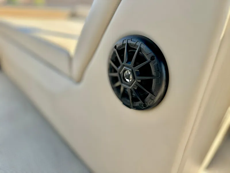Slide: The Image of Close-up of a speaker on a 2023 Massimo Marine P23 MAX boat. - 23