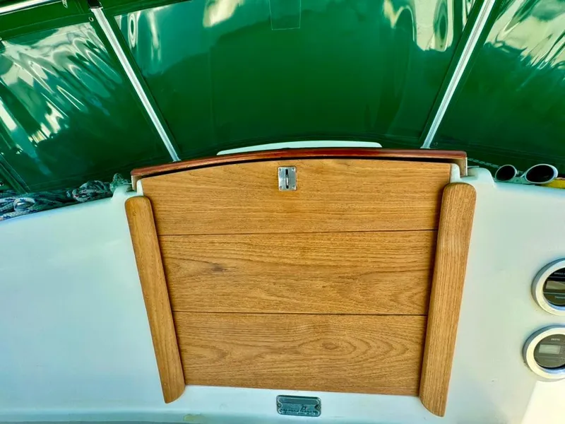 Slide: The Image of Wooden hatch on 1982 Pearson Ketch sailboat with green canopy. - 17