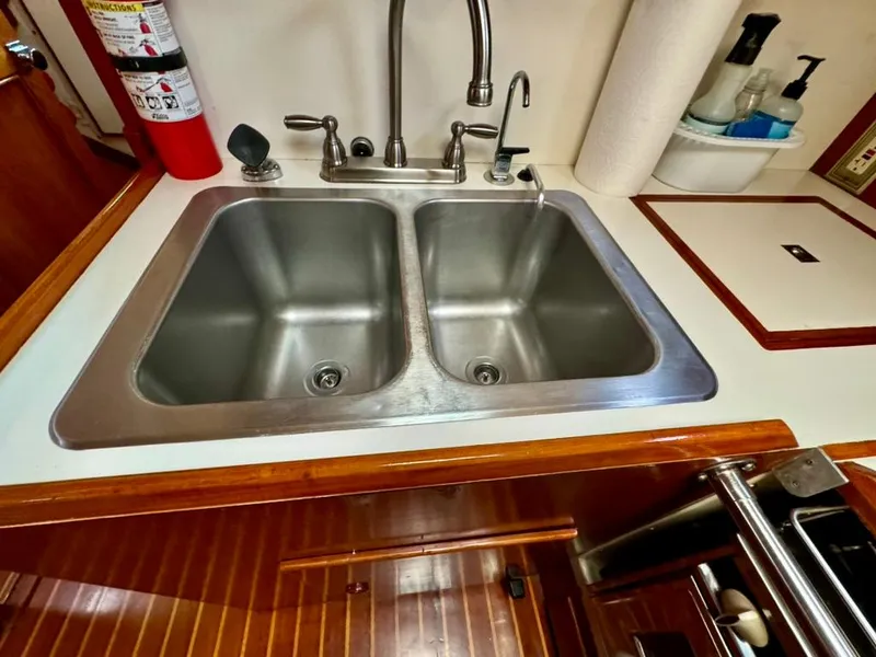 Slide: The Image of Stainless steel double sink in 1982 Pearson Ketch boat kitchen. - 49