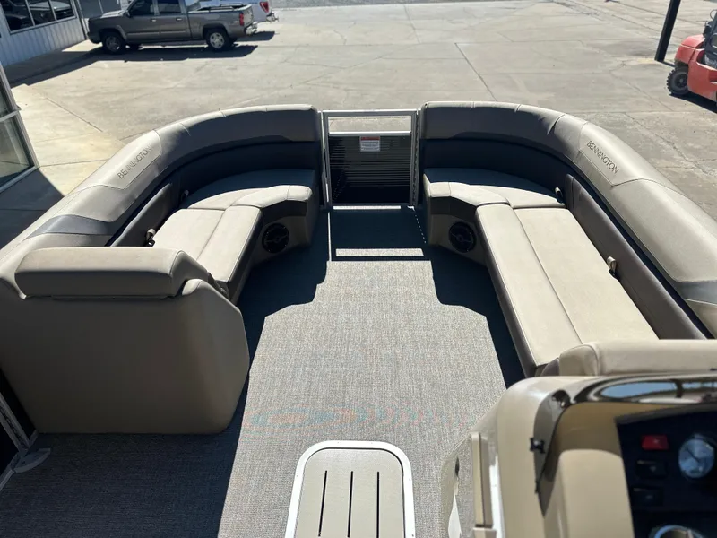 Slide: The Image of 2025 Bennington 22 SXS APG pontoon boat interior with spacious seating and modern design. - 6