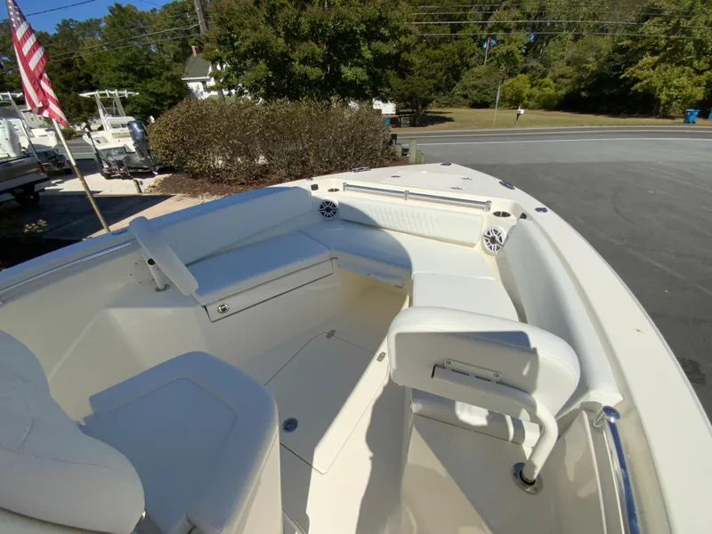 Slide: The Image of 2025 Cobia 240 Center Console boat with spacious seating and sleek design. - 14
