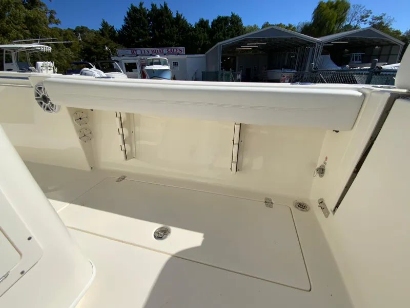 Slide: The Image of 2025 Cobia 240 Center Console boat interior with storage compartments. - 34