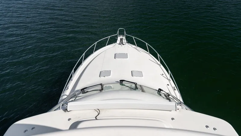 Slide: The Image of Cabo 44 HTX 2012 yacht bow view on calm water. - 26