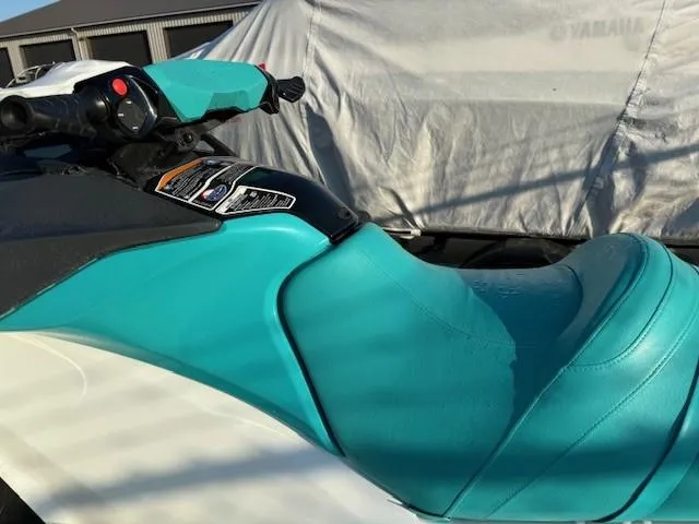Slide: The Image of 2021 Sea-Doo GTI 90 jet ski with turquoise seat and handlebars. - 3