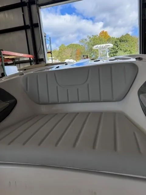 Slide: The Image of 2023 Flexboat Flex 450 interior view in a storage facility. - 7