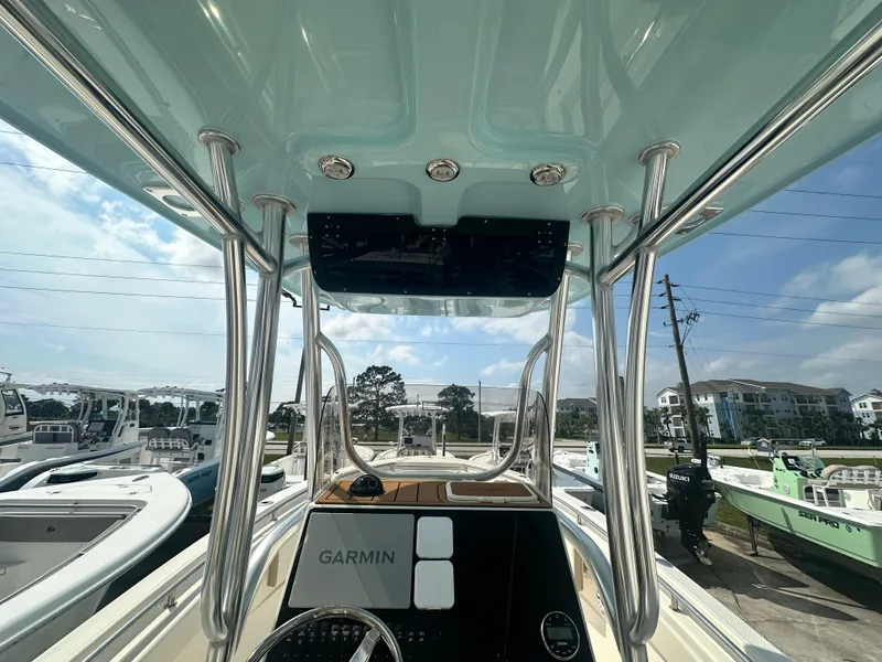 Slide: The Image of 2025 Bulls Bay 255 CC boat interior with Garmin navigation system. - 4