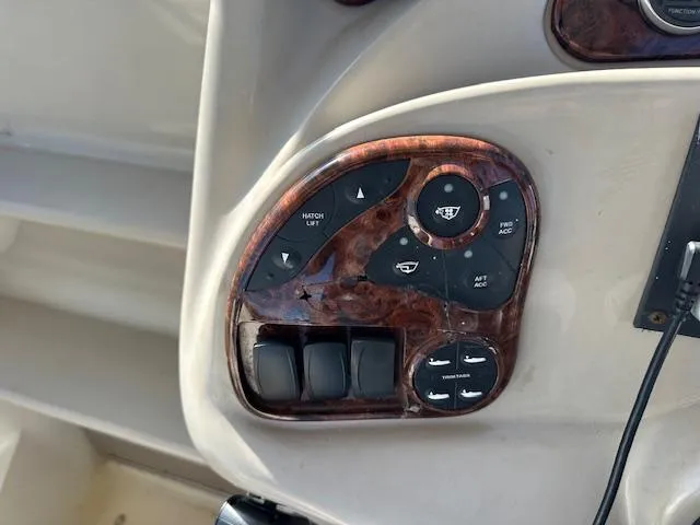 Slide: The Image of Control panel of a 2003 Sea Ray 280 Sundancer boat. - 8