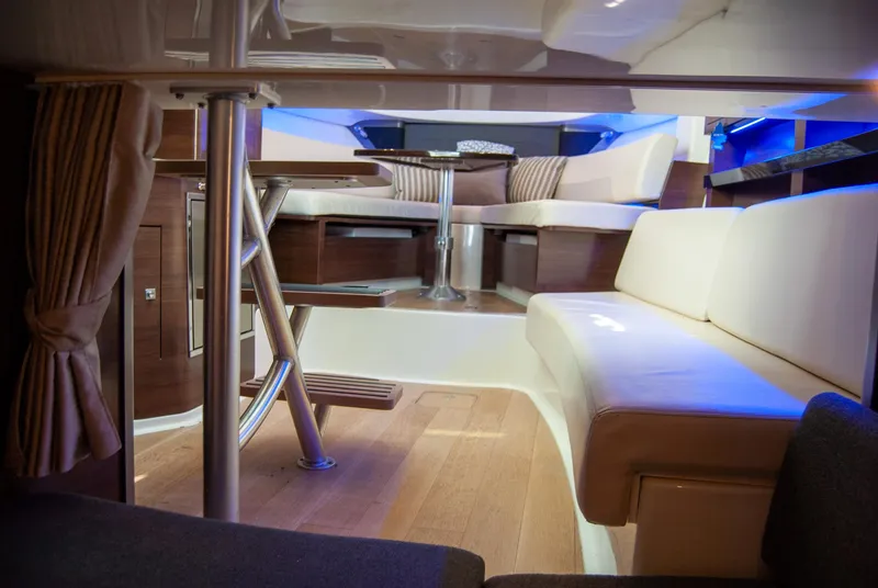 Slide: The Image of Interior of 2021 Boston Whaler 345 Conquest, featuring elegant seating and modern design. - 21