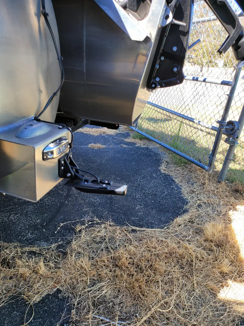 Slide: The Image of 2025 Quest M-22RLS LIMITED trailer hitch near chain-link fence. - 11