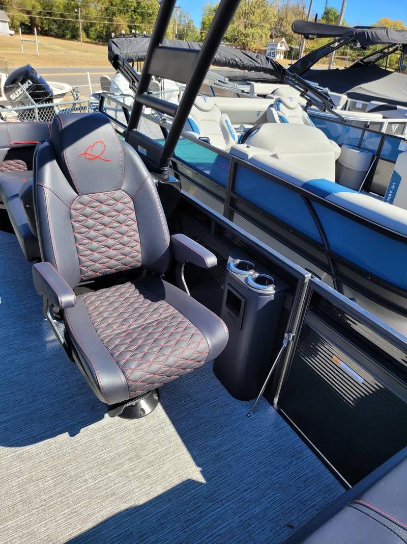 Slide: The Image of 2025 Quest M-22RLS LIMITED boat interior with luxury seating and cup holders. - 17